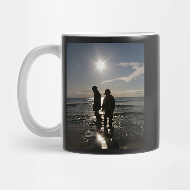 Children Silhouetted On A Beach by archiesgirl